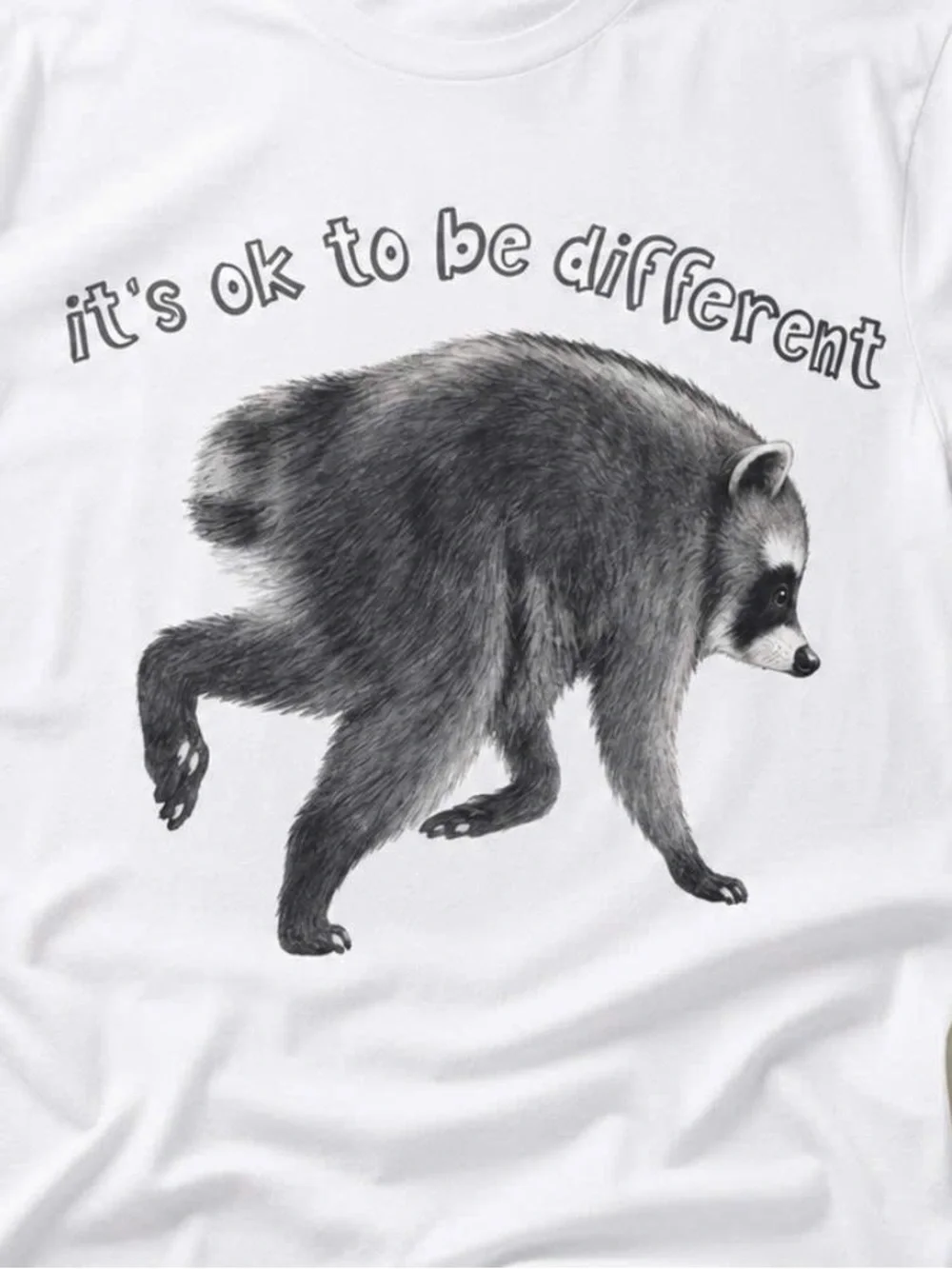 It's OK To Be Different Jimothy Raccoon Graphic Tee Shirt - White